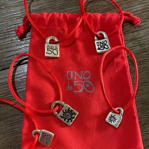 Uno de 50 red cord and silver tag…